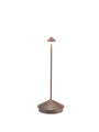 Zafferano Pina Tischlampe kabellos wiederaufladbar - Corten. Zylindrische Form, Cortenfarben. Liefert Akzentlicht für Innen- und Außenbereiche.