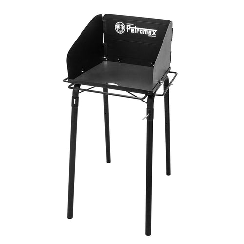 Petromax Feuertopf Tisch – Dutch Oven & Kohle Outdoor Tisch. Schwarzer Metalltisch mit Dutch Oven-Aussparung für stabile Outdoor-Kochstelle.