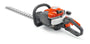 Husqvarna 122HD60 Benzin-Heckenschere, typisch grün-orange, mit langem Schneidbalken zur präzisen Pflege von Hecken mit 59 cm Schnittlänge.