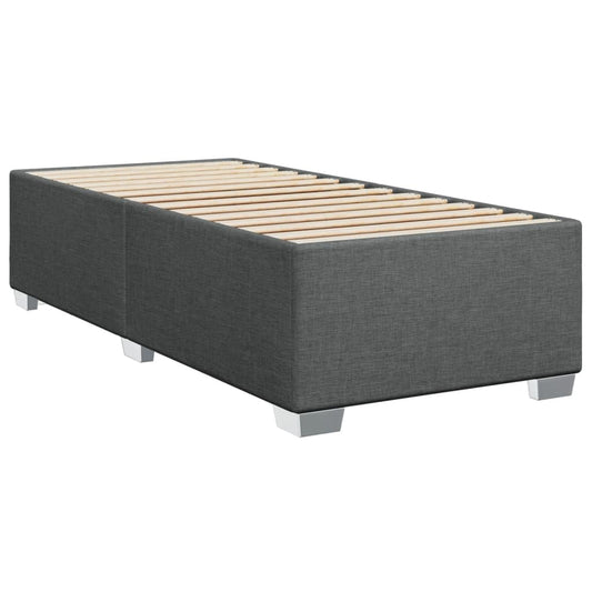 vidaXL Polsterbett Dunkelgrau 100x200cm Stoff, ein gepolstertes Bettgestell, das als Schlafplatz dient.