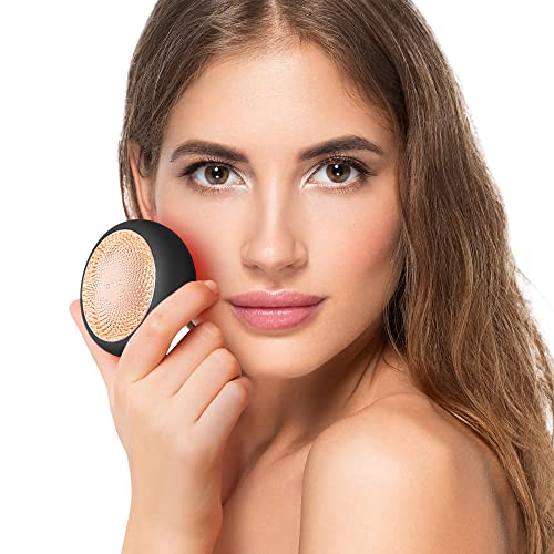 FOREO UFO 2 LED-Gesichtsmaske - Rotlichttherapie & Wärme. Runder, pinkfarbener Gesichtsapparat. Verwendet Rotlicht und Wärme zur Aktivierung von Gesichtsmaskenwirkstoffen für verbesserte Hautpflege.
