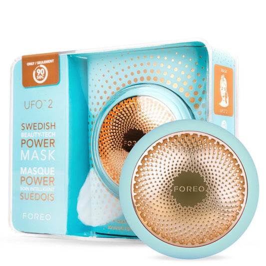 Foreo UFO 2 LED Gesichtsmaske - Rotlichttherapie. Rotes, scheibenförmiges Gerät. Nutzt Rotlicht zur Kollagenstimulation und Reduktion feiner Linien auf der Gesichtshaut.
