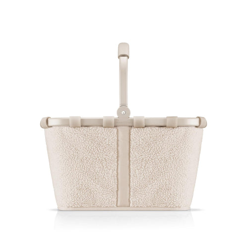 reisenthel carrybag teddy stabiler Einkaufskorb - sand. Rechteckiger Korb in Sand, Teddy-Optik, mit Tragegriff zum Transport von Einkäufen.