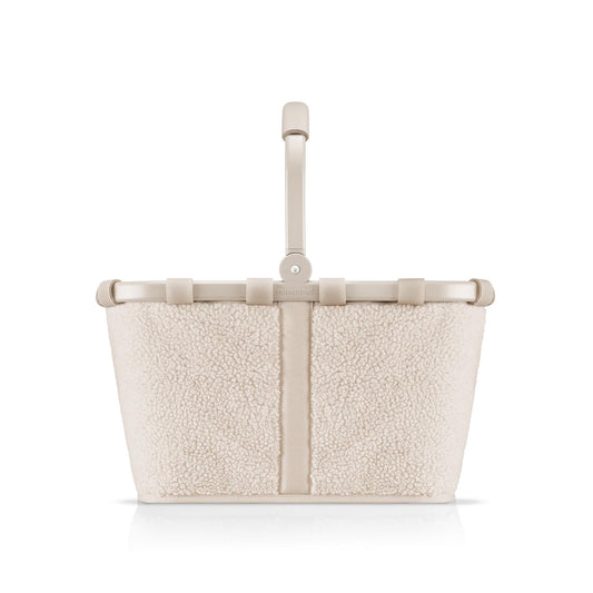 reisenthel carrybag teddy stabiler Einkaufskorb - sand. Rechteckiger Korb in Sand, Teddy-Optik, mit Tragegriff zum Transport von Einkäufen.
