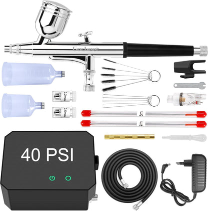 Powate 40 PSI Dual Action Airbrush Set mit Kompressor. Kompaktes Set mit silberner Pistole und schwarzem Kompressor. Für präzise Farbanwendungen.