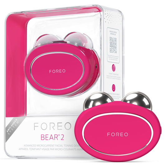 FOREO BEAR 2 Mikrostrom Gesichtsmassagegerät – Fuchsia. Fuchsiafarbenes Gerät mit Kontaktkugeln zur Muskelstimulation und Hautstraffung.