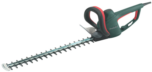 Metabo HS 8765 Heckenschere, grün, mit 65 cm Schnittlänge. Trimmt präzise Hecken und Sträucher.