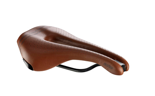 Selle Italia Superflow Fahrradsattel, braun, ergonomisch geformt mit Superflow-Aussparung. Bietet Druckentlastung beim Radfahren.
