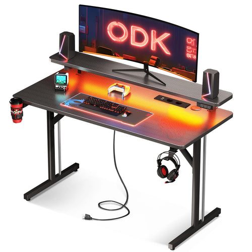 ODK Gaming Schreibtisch 100cm – LED, Steckdosen, Carbon Schwarz. Carbon-schwarzer Gaming-Tisch mit LED & Steckdosen für PC-Setups.