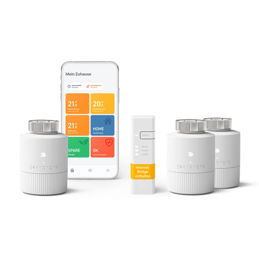 tado° BASIC Heizkörperthermostat Starter Kit V3+ (3er-Set). 3 weiße, zylindrische Thermostate für effiziente Raumtemperaturkontrolle.
