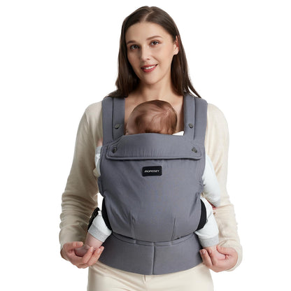 Momcozy Ergonomische Babytrage. Grau, mit gepolstertem Gurtsystem. Ermöglicht komfortables Tragen von Babys u. Kleinkindern.