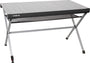 BRUNNER Camping Tisch Titanium Axia 4 - Silber/Schwarz. Rechteckiger Tisch mit silbernem Rahmen und schwarzer Platte zur Nutzung als stabile Ablage beim Camping.