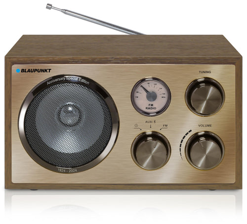 Blaupunkt RXN 180 Nostalgieradio UKW Bluetooth - Holz Messing. Rechteckig, Holz mit Messing-Akzenten. Spielt UKW-Radio und streamt Audio via Bluetooth.