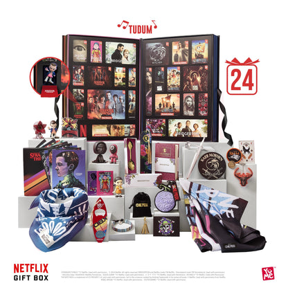 YuMe 15309 Netflix Gift Box Adventskalender Soundeffekt. Farbige Geschenkbox mit 24 Türchen, bietet Überraschungen und Soundeffekte bis Weihnachten.