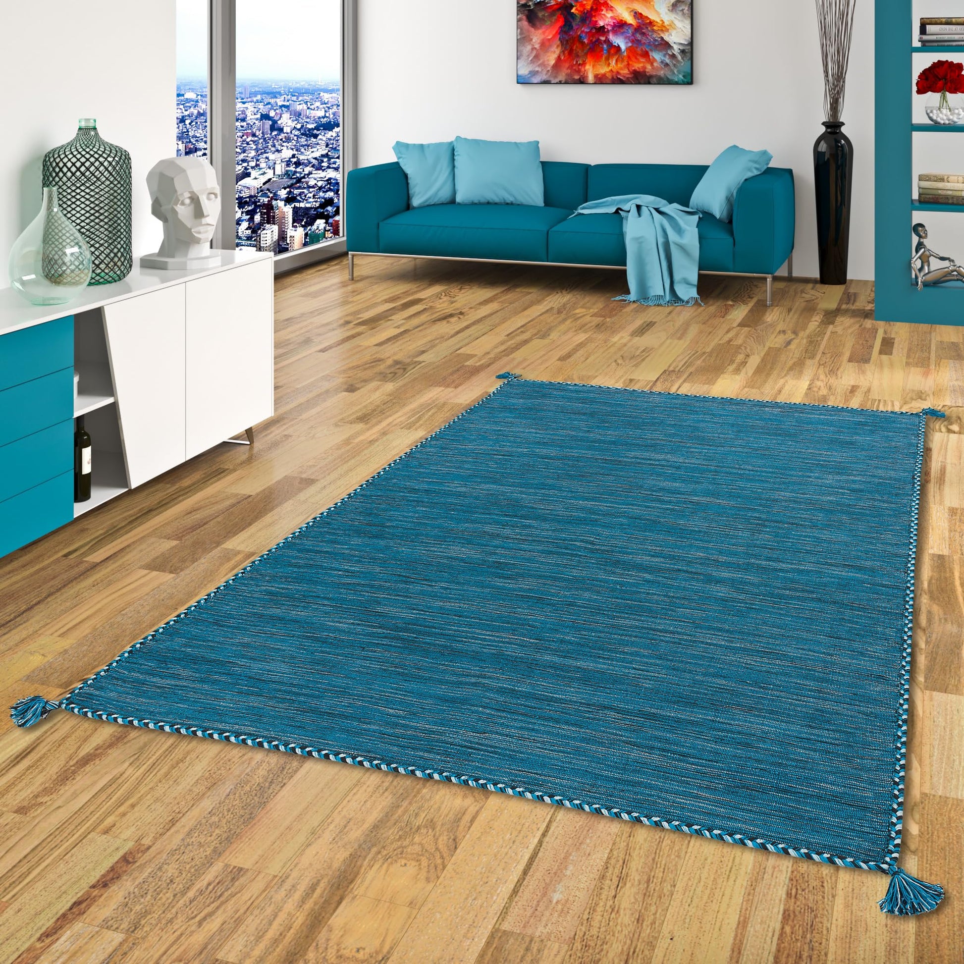 Natur Teppich Kelim Prico aus Baumwolle, flachgewebt, rechteckig in Blau Petrol. Dient als Bodenbelag für Wohnbereiche.
