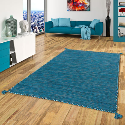 Natur Teppich Kelim Prico aus Baumwolle, flachgewebt, rechteckig in Blau Petrol. Dient als Bodenbelag für Wohnbereiche.